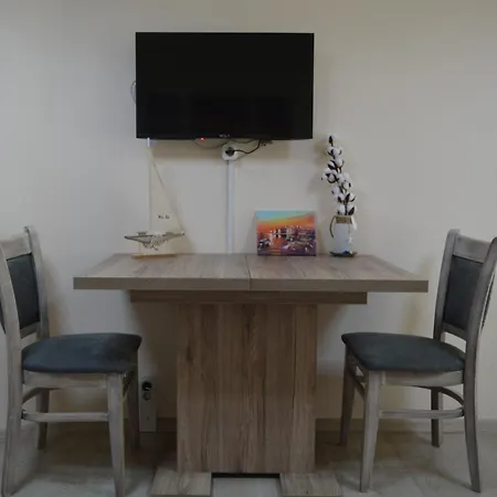 Apartment Center With A Backyard Burgas